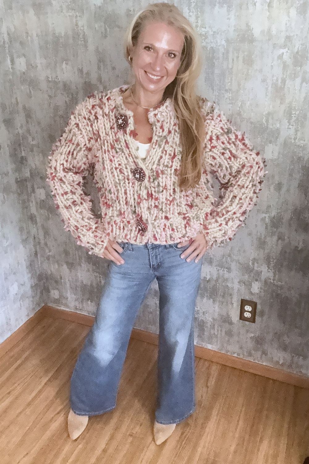 A flecked knit in the ash-rose family